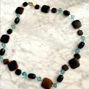 Crystal and dark tortoise like necklace